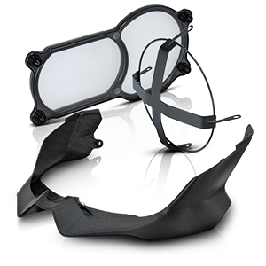 Motorcycle frame protection made of carbon and plastic.